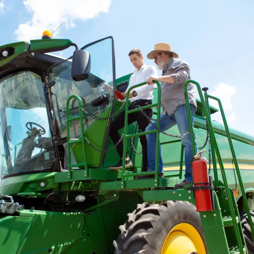 farmer-with-tractor-combine-at-field-in-sunlight-confident-bright-colors-1