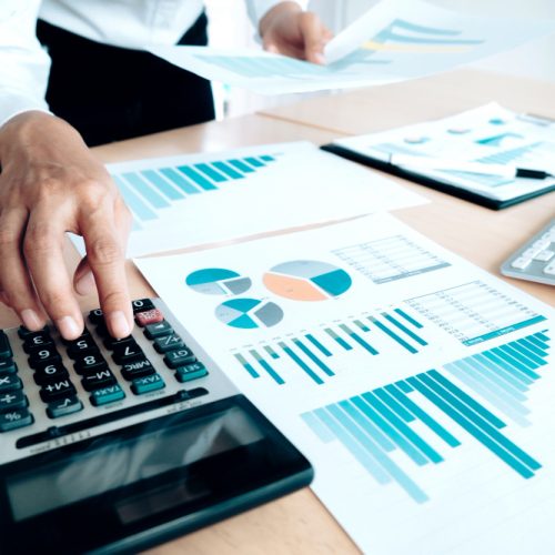 finances-saving-economy-concept-female-accountant-or-banker-use-calculator